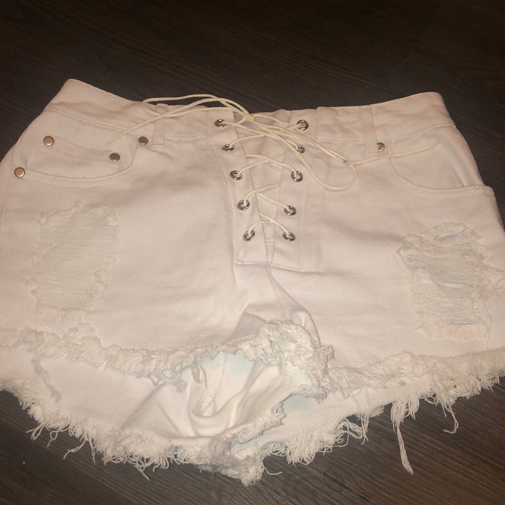 White lace up jean shorts